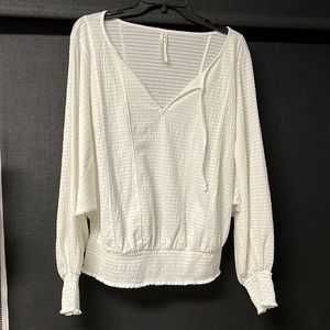 White Anthropologie blouse with puff sleeve